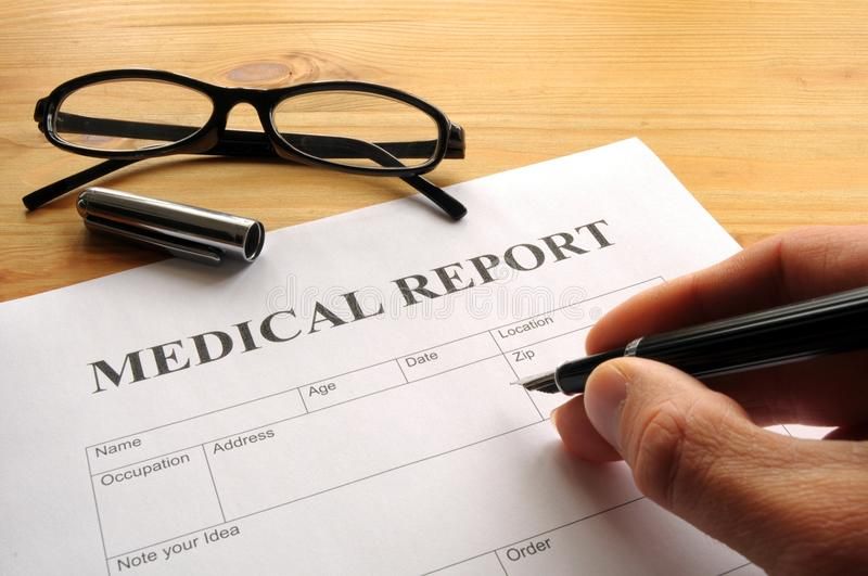 Printed lab reports being handed over at the reception desk